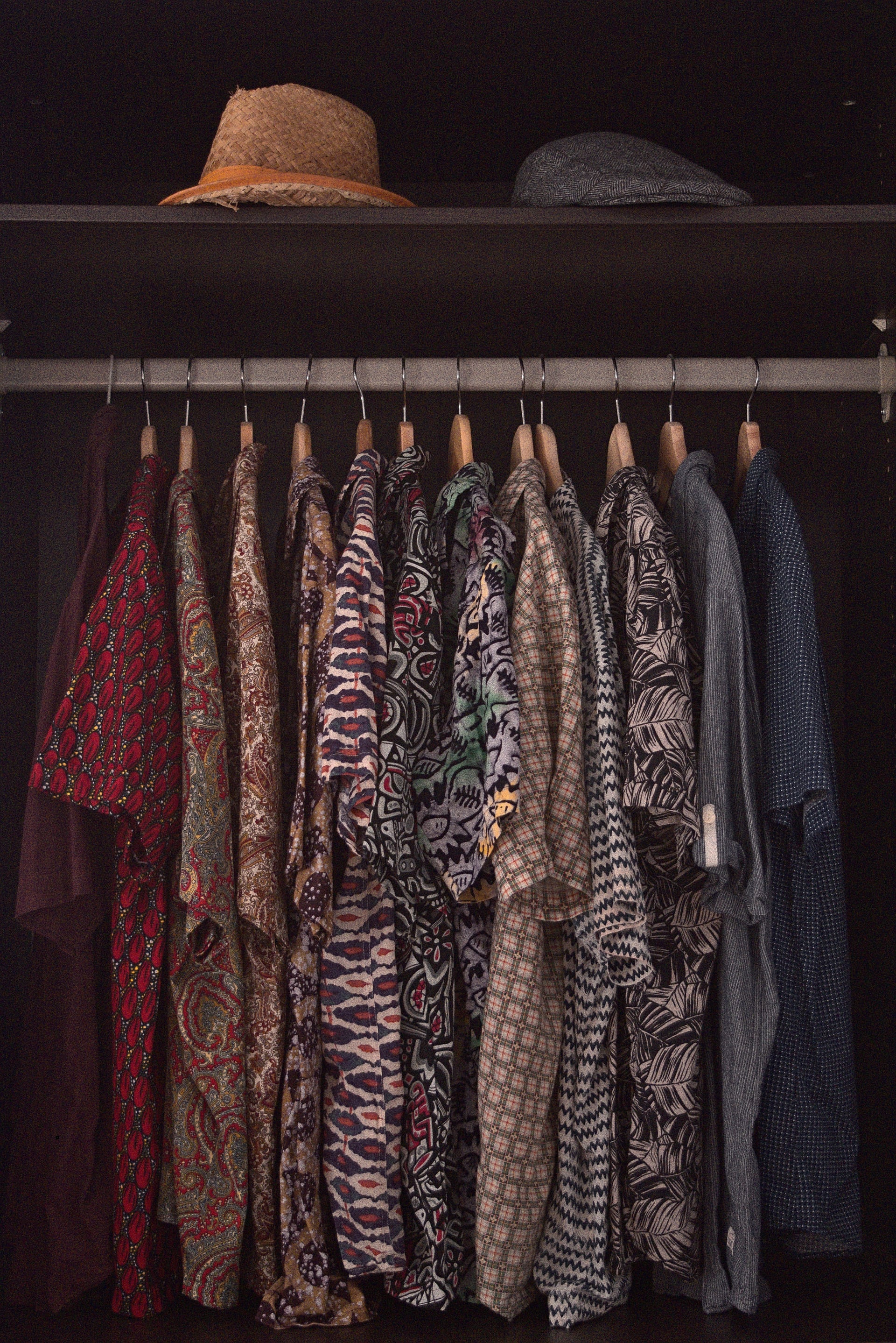 Wardrobe of colourful, patterned shirts