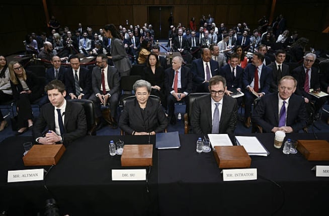 The source image used for the analysis test, showing Sam Altman and Lisa Su in a crowded U.S. Senate hearing.