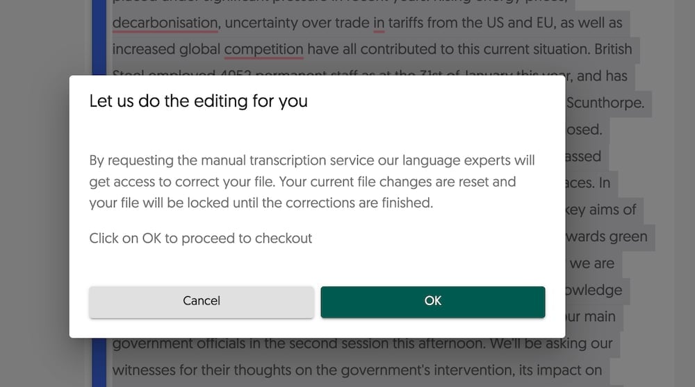 Amberscript prompt offering manual human transcription, warning edits reset and the file locks until corrections finish